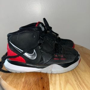 Black, red and white toddler Nike’s